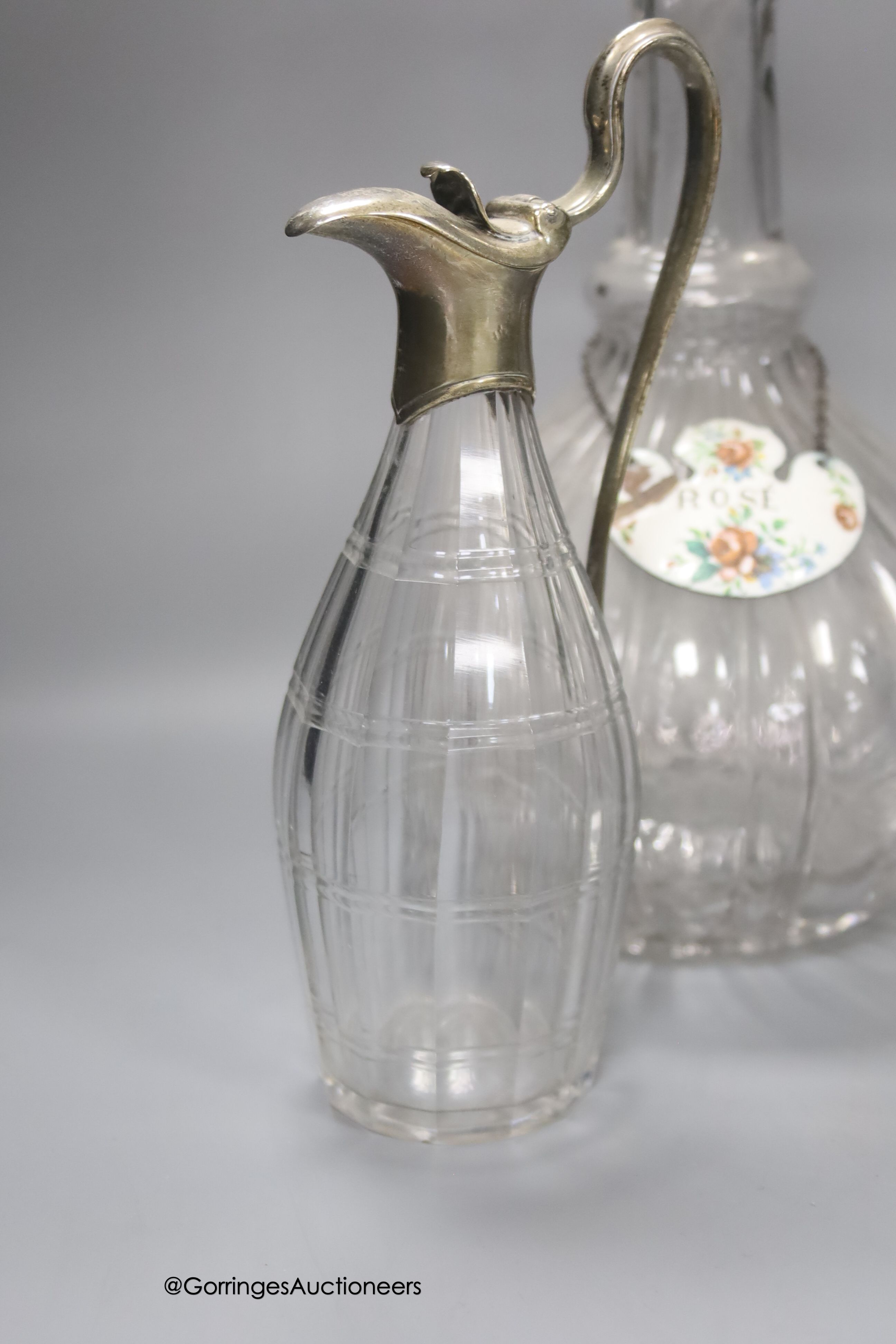A pair of glass decanters with enamelled labels, 32cm, a pair of cut glass vinegar bottles and a Georgian style wine glass